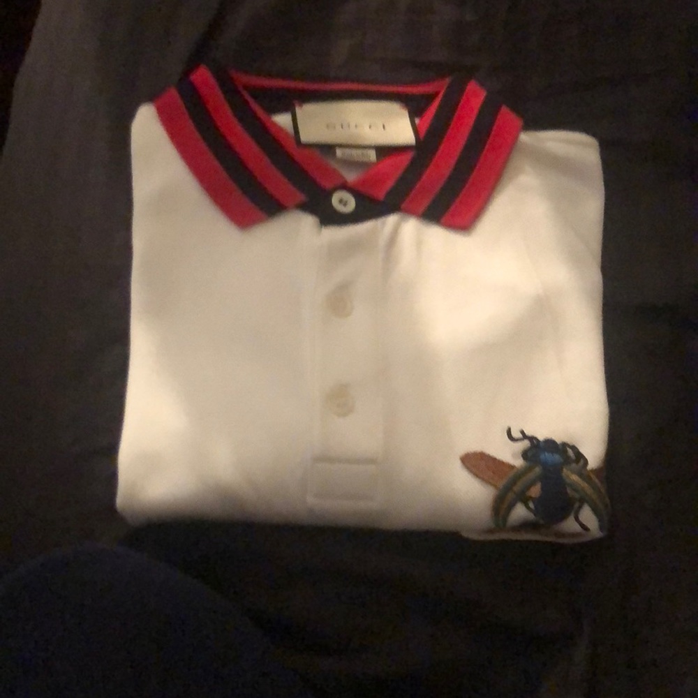 A Gucci shirt .